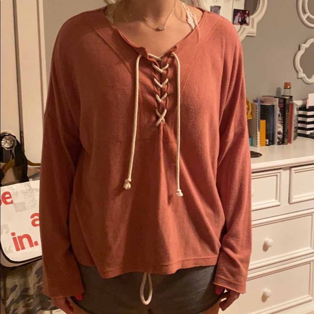 coral lace up sweater